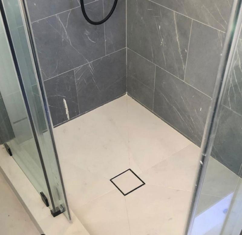 https://www.showerdrainsshop.com/cdn/shop/products/square-shower-drain-tile-insert-design-by-serenedrains_4847a977-ebb5-4fbb-9900-cc81172d1cb7_1024x1024.jpg?v=1616807783